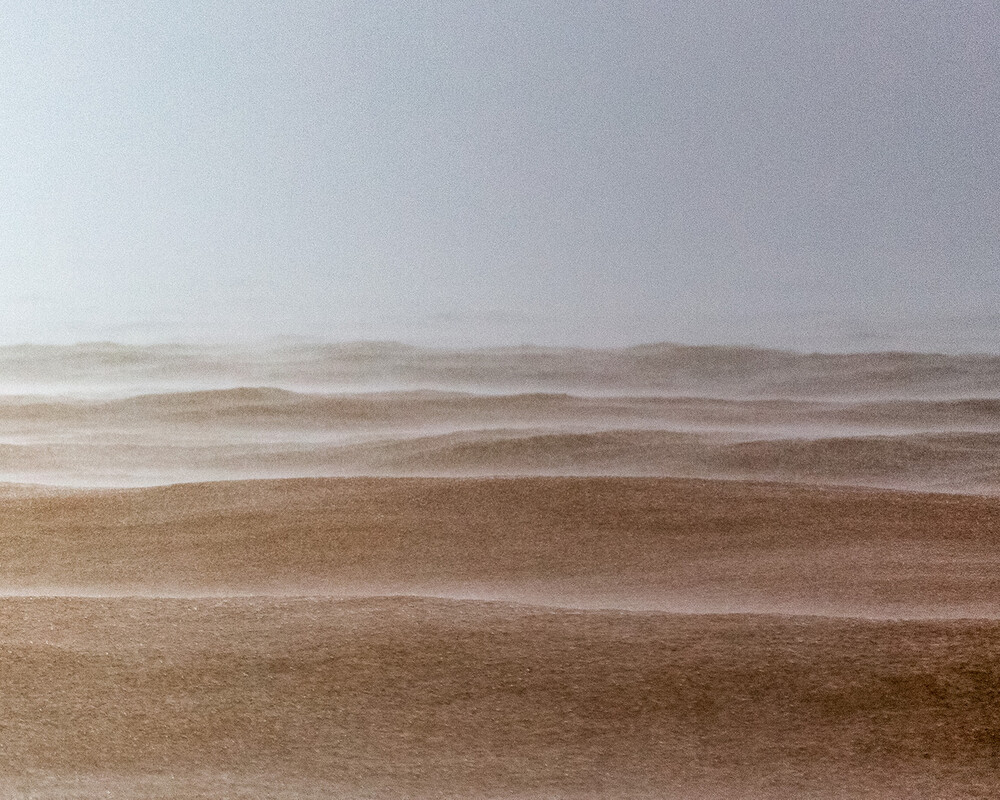 A man swims in the ocean