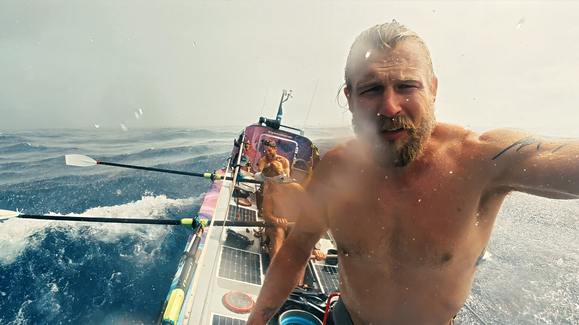 Maclean's brother battles strong ocean waves in a rowboat